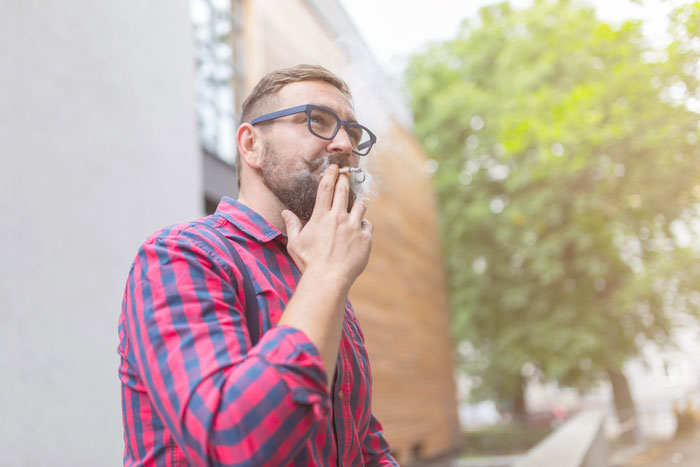 man smoking cannabis