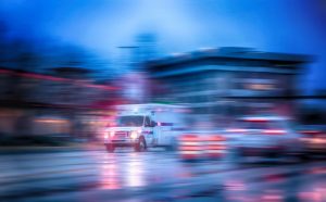 fluoroquinolone-an ambulance rushes through traffic