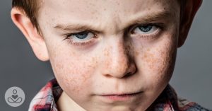 What Is Oppositional Defiant Disorder? freckled boy looking angry