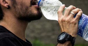 There Is No Excuse for You to Casually Drink Bottled Water man drinking water from plastic bottle