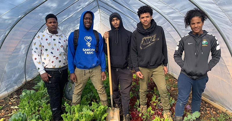 teenagers in greenhouse
