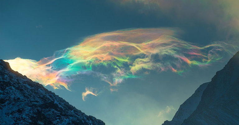 Stunning Iridescent Clouds Snapped Above Skies of Siberia’s Belukha Mountain - Featured image