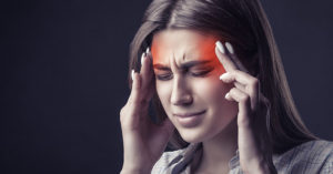 10 Warning Signs Your Headache Could Be Dangerous woman with headache