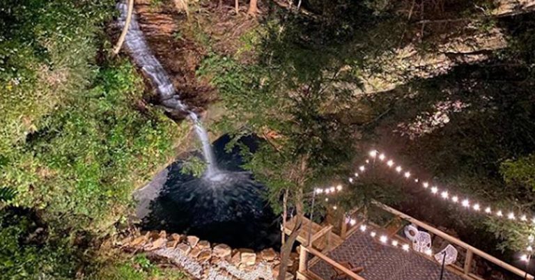 Cabin Hiding In The Hills Has A Heated Waterfall Swimming Hole - Featured image