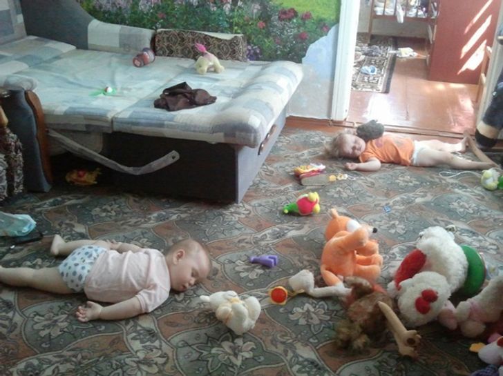 babies passed out on bedroom floor