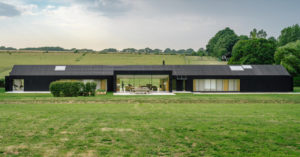 Black-Gabled Farmhouse Harvests its Own Electricity, Heat, and Water black gabled farmhouse