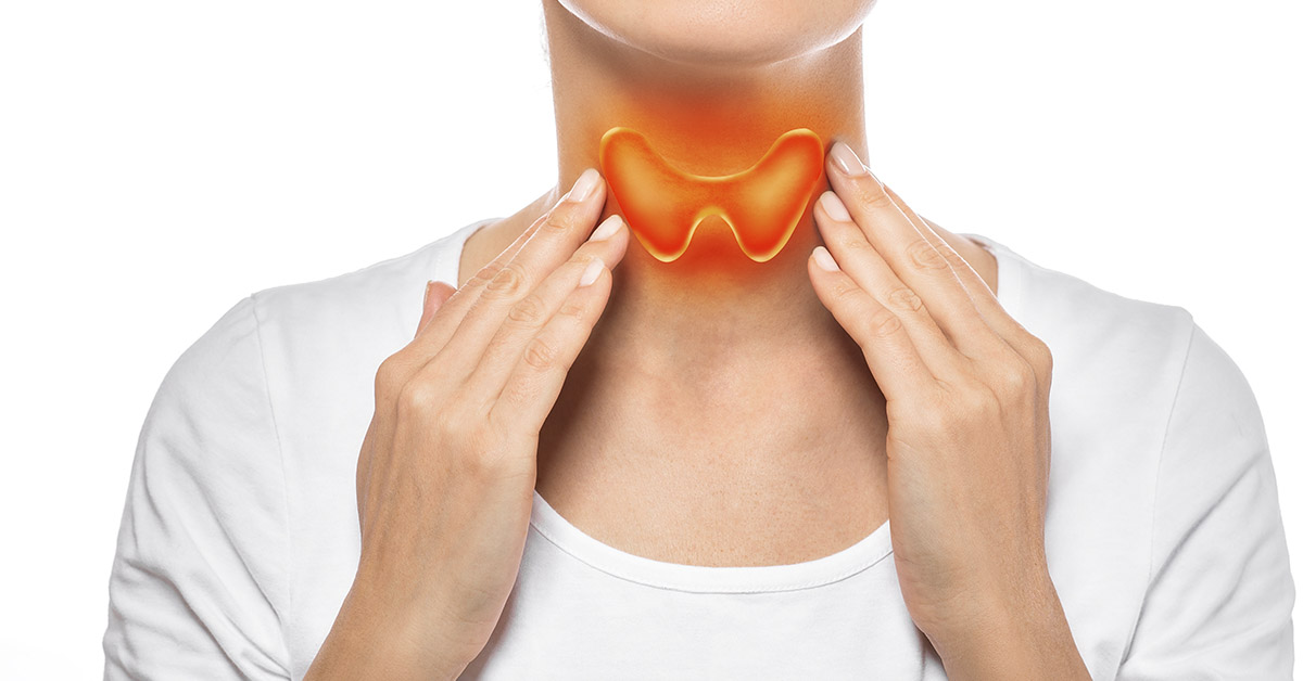 person holding neck with thyroid highlighted in orange
