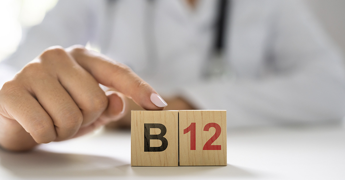 vitamin B 12 being represented by two small wooden blocks one with a B the other with 12.