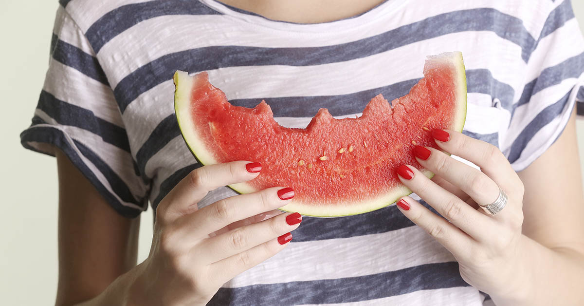 person eating watermelon