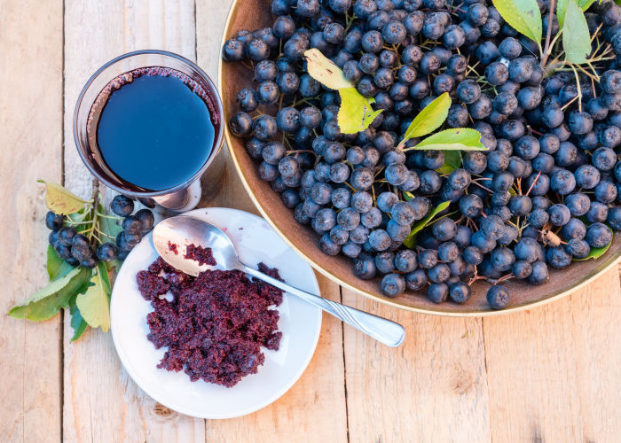 chokeberries, chokeberry juice and jam. Also known as aronia berries