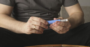man holding semaglutide