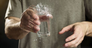 man with shaking hands, Parkinson's Disease symptoms