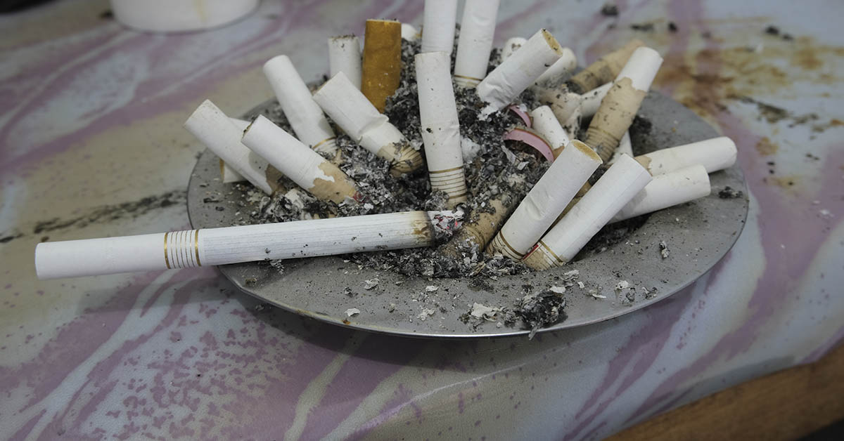 ashtray full of cigarettes