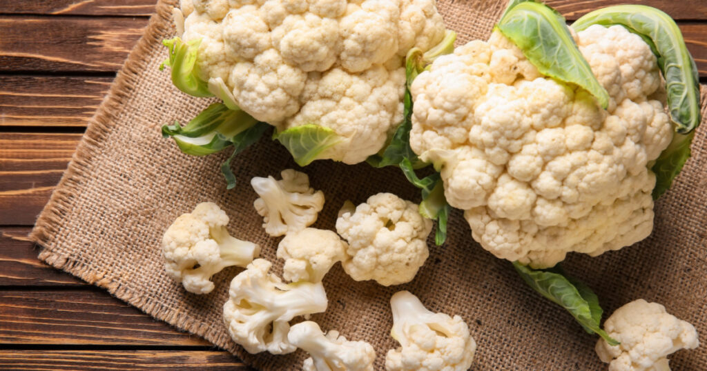 Fresh cauliflower on wooden table
