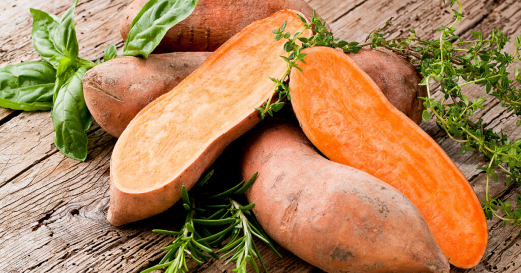 Sweet potato on Wooden background
