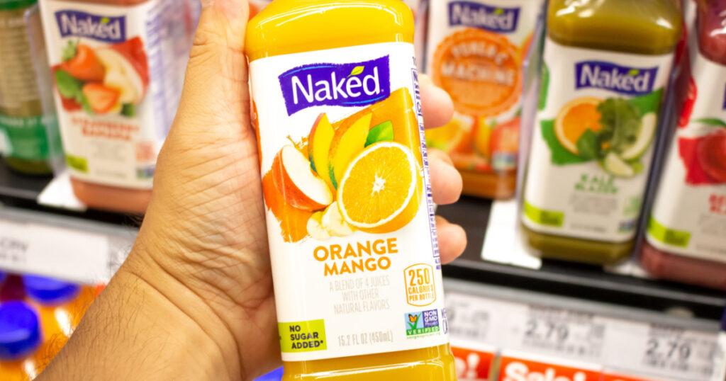 Los Angeles, California, United States - 08-09-2019: A view of a hand holding a bottle of Naked Orange Mango juice at the grocery store.
