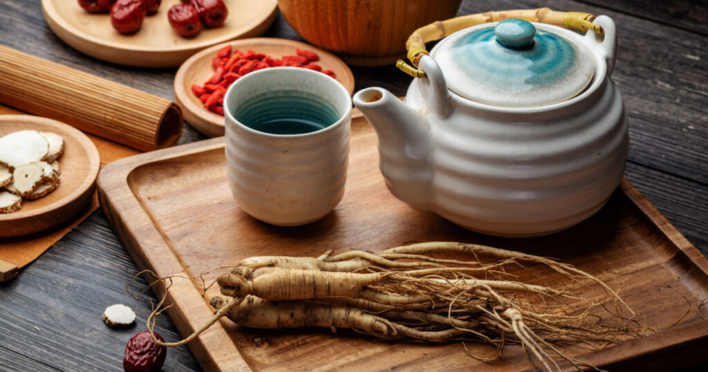 Ginseng and tea cup are on the table
