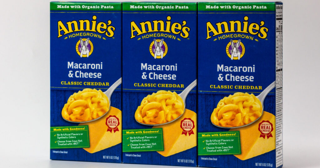 ST. PAUL, MN,USA - MARCH 9, 2021 - Annie's Homegrown Macaroni and Cheese packages and trademark logo.
