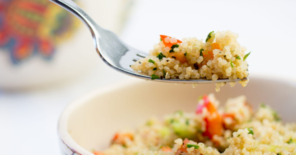 quinoa salad weight loss foods close up in a white bowl
