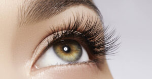 womans eye with eyelashes done