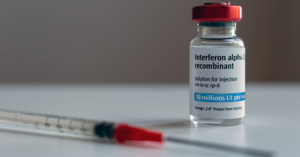 Bottle of interferon alpha 2b and syringe (artistic rendering)
