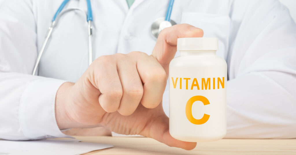 Vitamin C and supplements for human health. Doctor recommends taking vitamin C. doctor talks about Benefits of vitamin C. Essential vitamins and minerals for humans. C Vitamin Health Concept.
