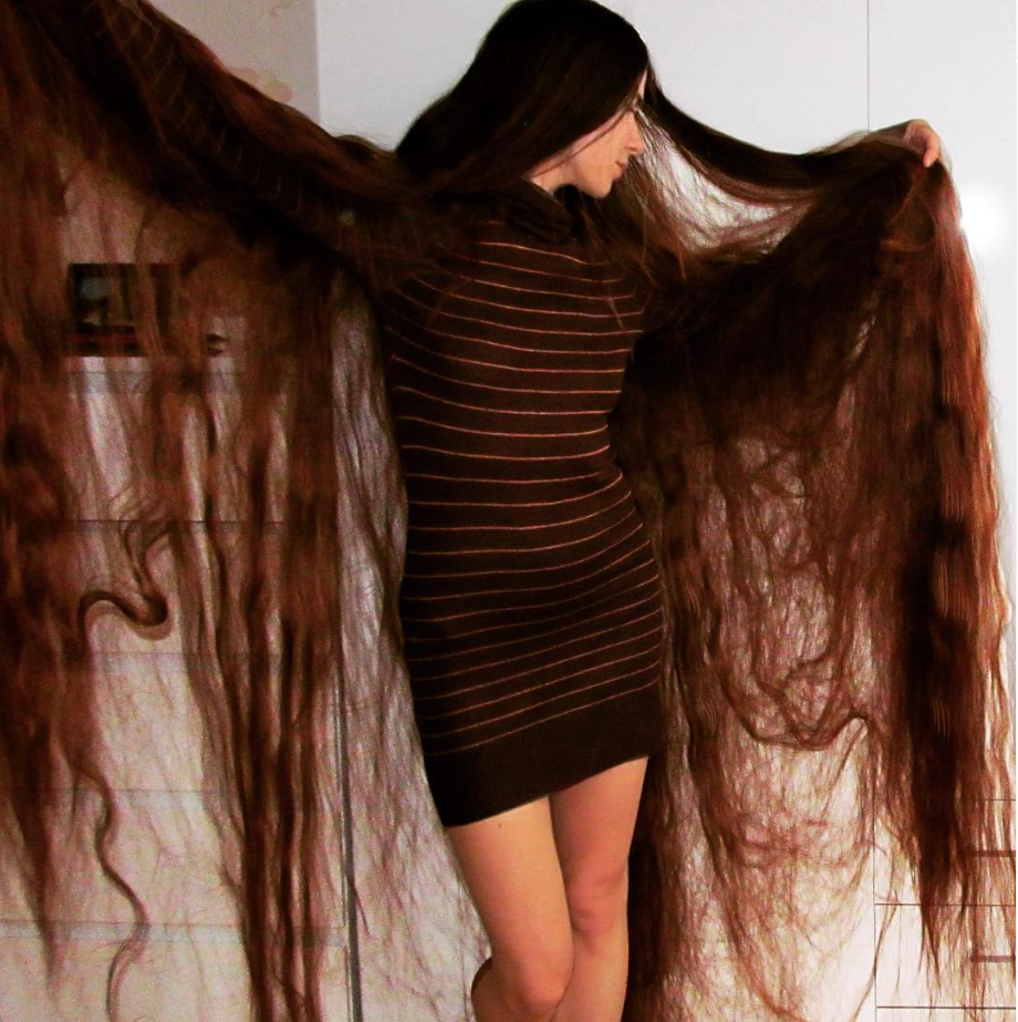 Aliia Nasroya long-haired woman