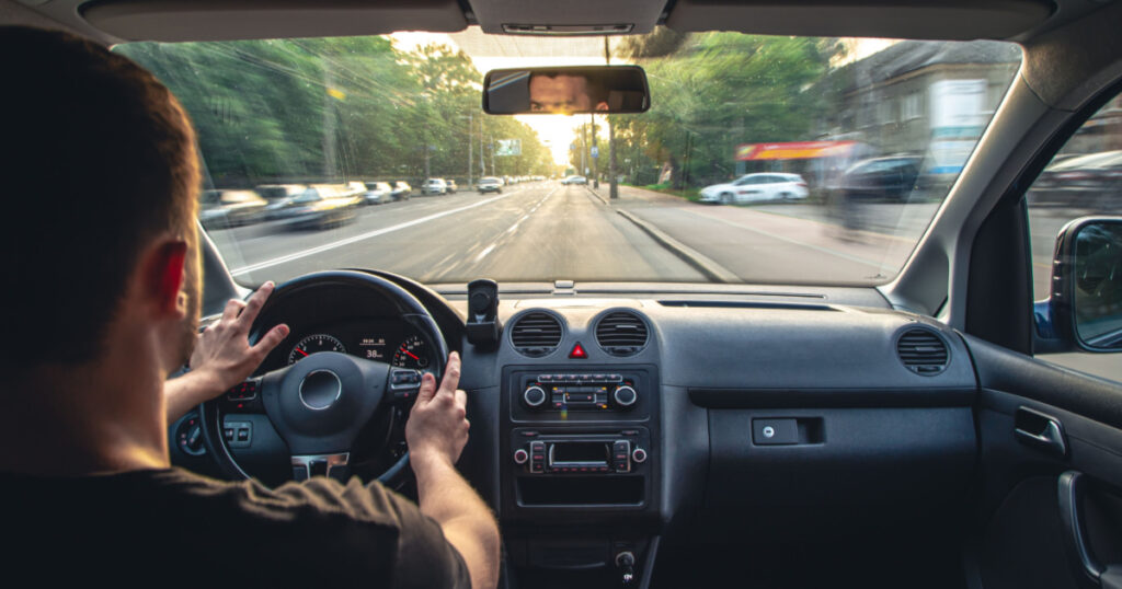 Hands on the wheel when driving at high speed from inside the car.
