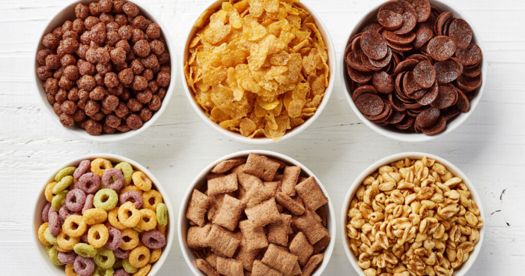 Bowls of various cereals from top view
