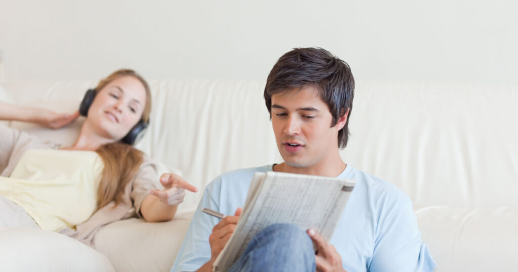 man playing puzzle games with girlfriend