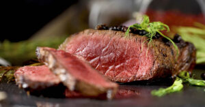 rare steak with red juices flowing