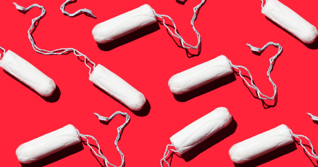feminine hygiene tampons on a red background. Menstruation concept
