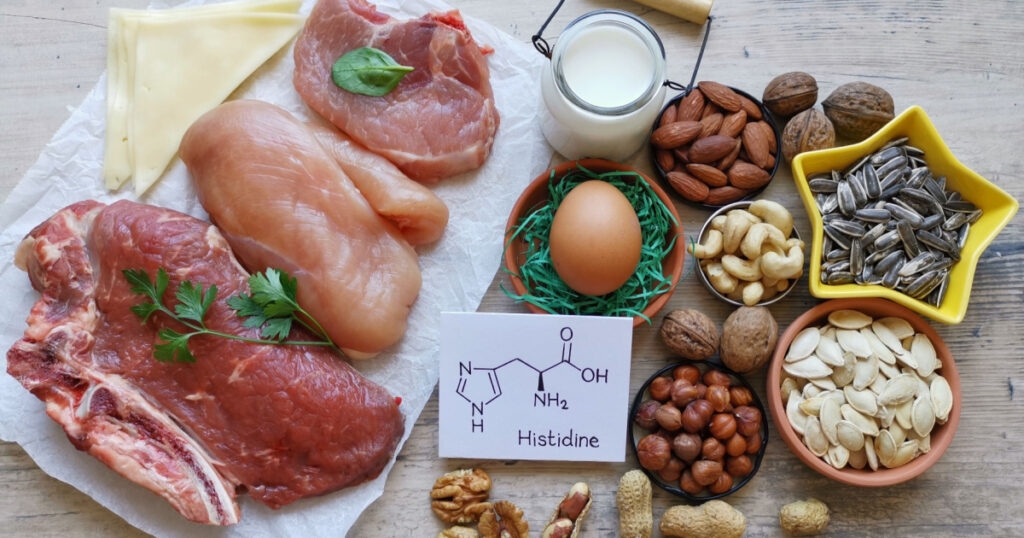 Histidine rich food with structural chemical formula of essential amino acid histidine. Natural food sources of histidine include high protein foods like eggs, dairy products, meat, nuts, seeds.