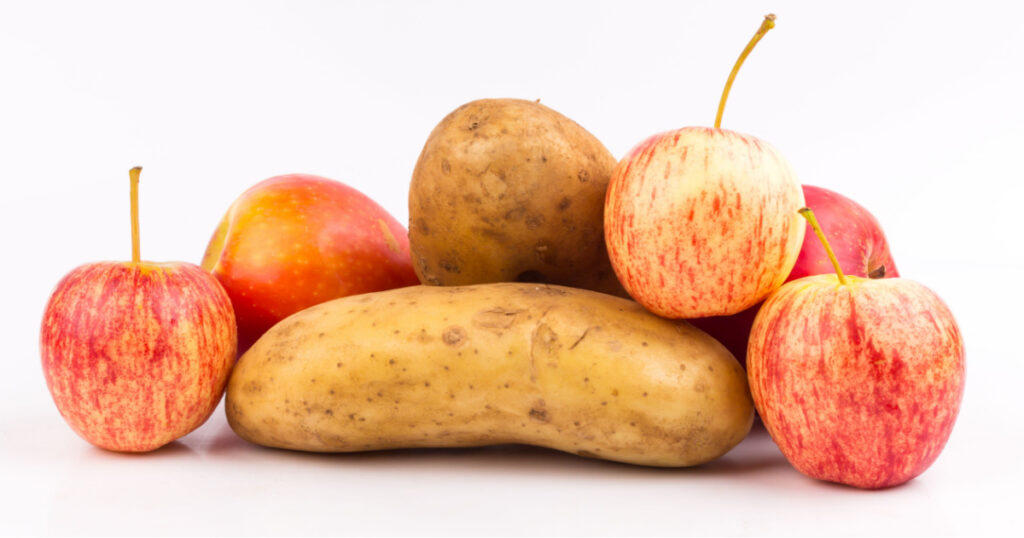 apple and potato on white background
