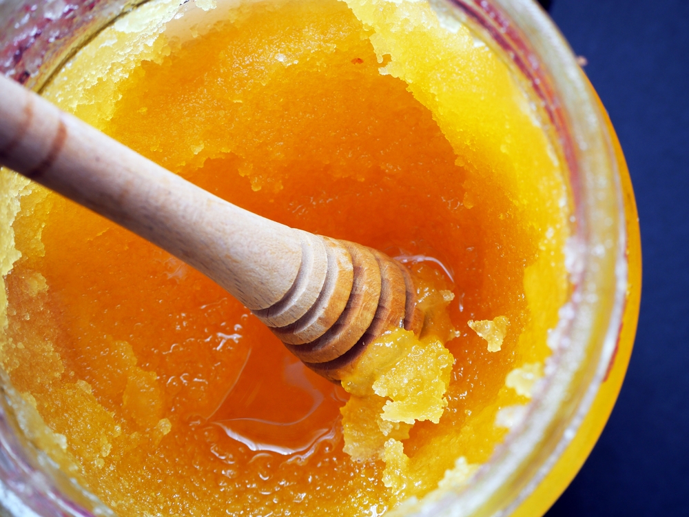 Crystallized honey in a glass jar