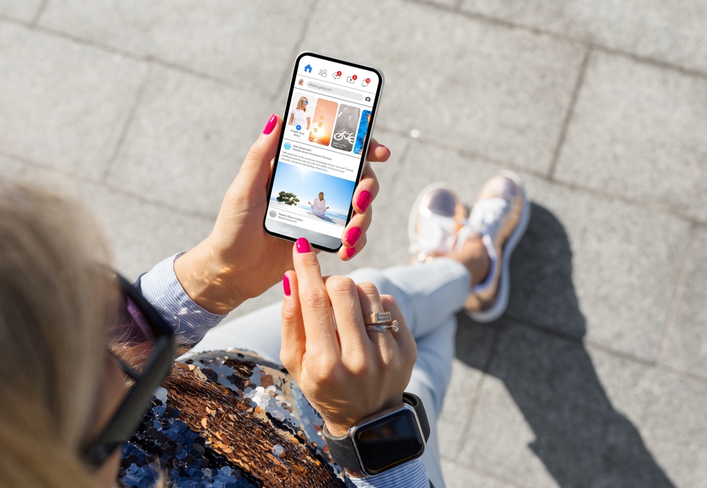 Woman using social media app on mobile phone