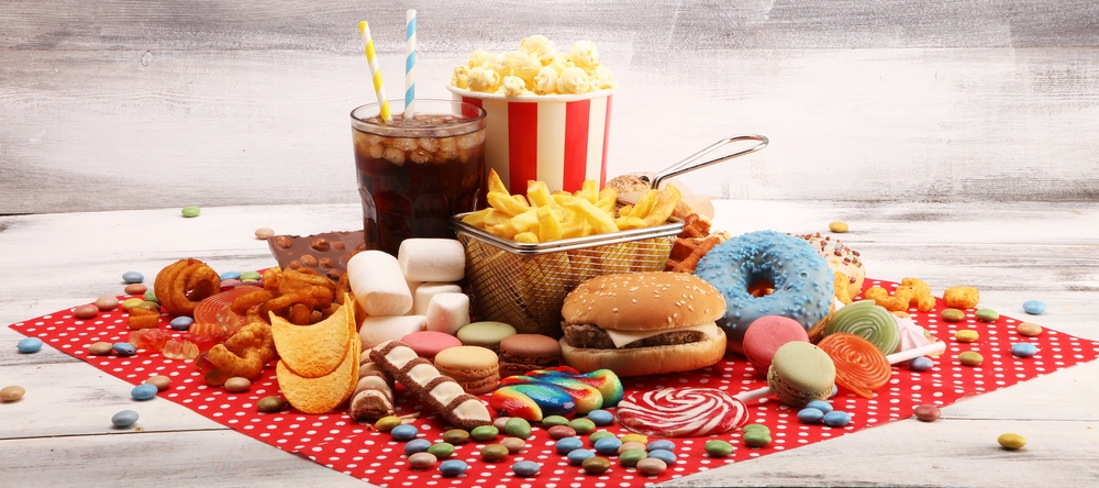 Unhealthy products. food bad for figure, skin, heart and teeth. Assortment of fast carbohydrates food.