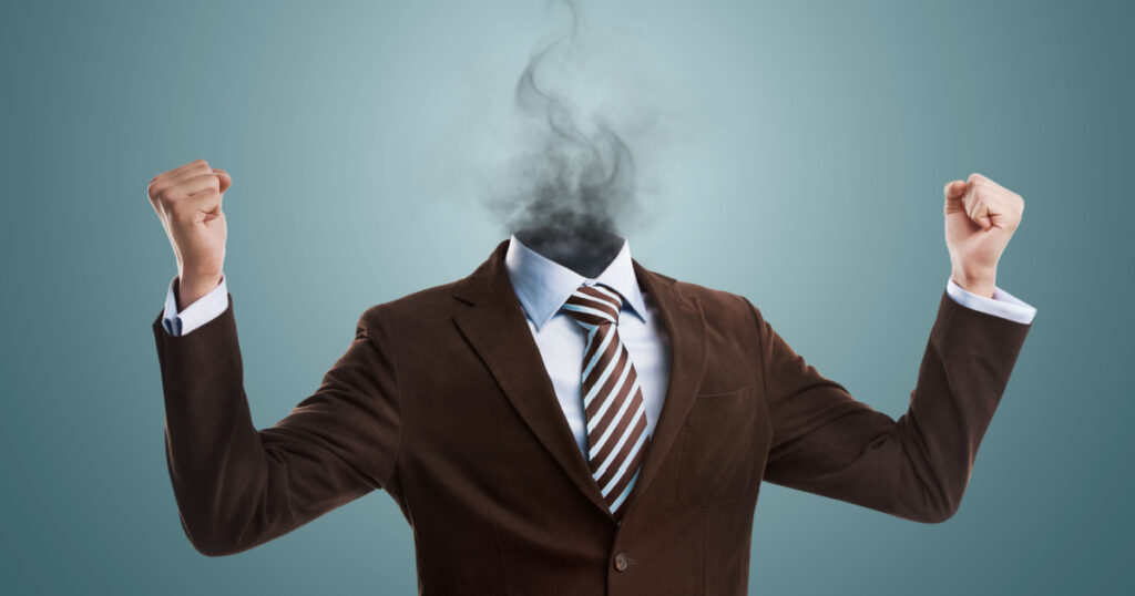 Overworked burnout business man standing headless with smoke instead of his head. Strong stress concept