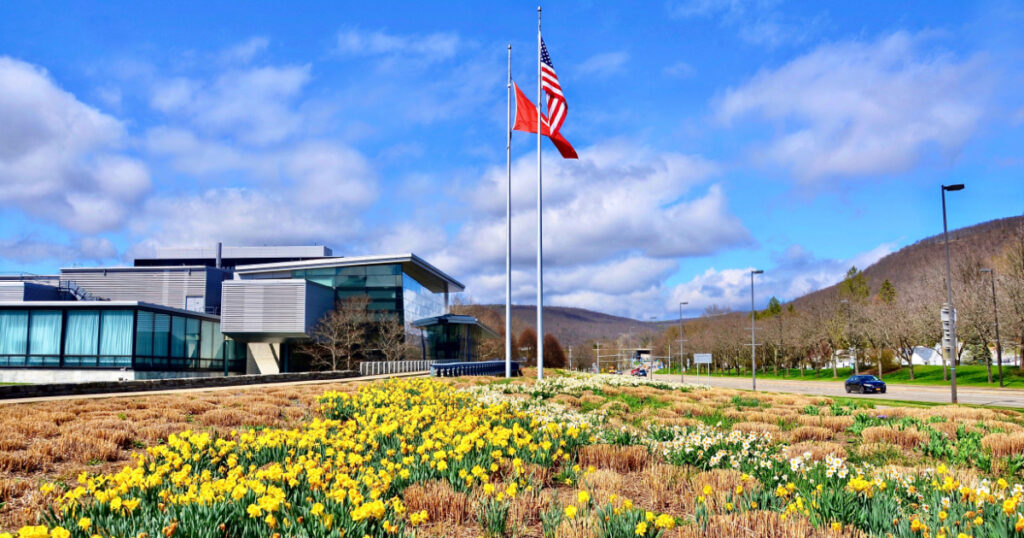 Corning, New York, US- April 13, 2021: Corning Museum of Glass, the modern glass building, is dedicated to the art, history and science of glass and was founded in 1951 by Corning Glass Works.