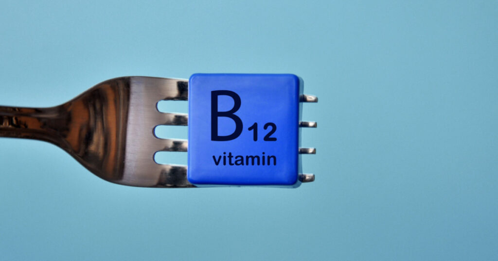 Vitamin B12 on the fork. Food with a high content of vitamin B