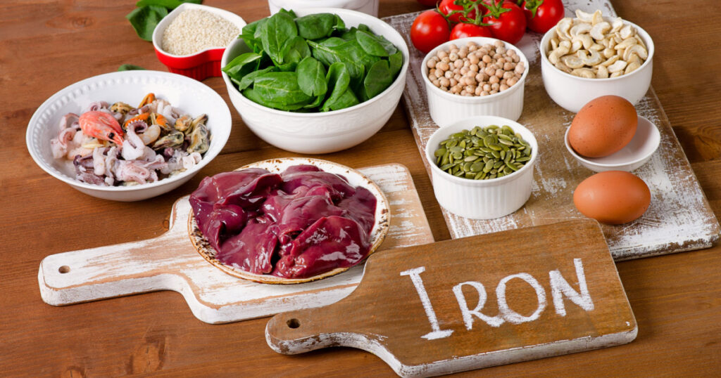 Foods high in Iron, including eggs, nuts, spinach, beans, seafood, liver, sesame, chickpeas, tomatoes.