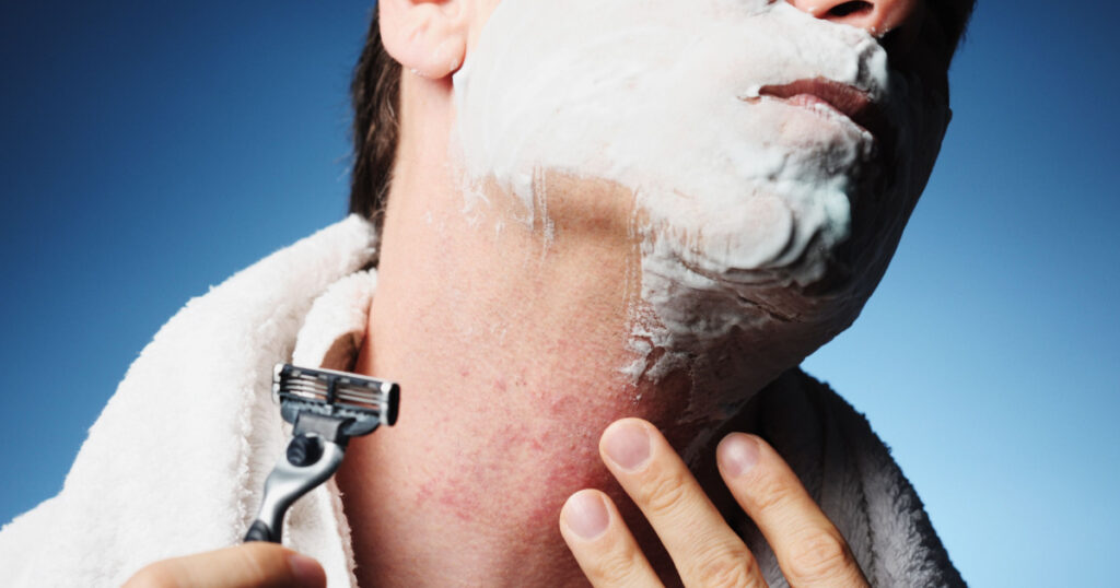 Closeup Man Shaving Razor Burn