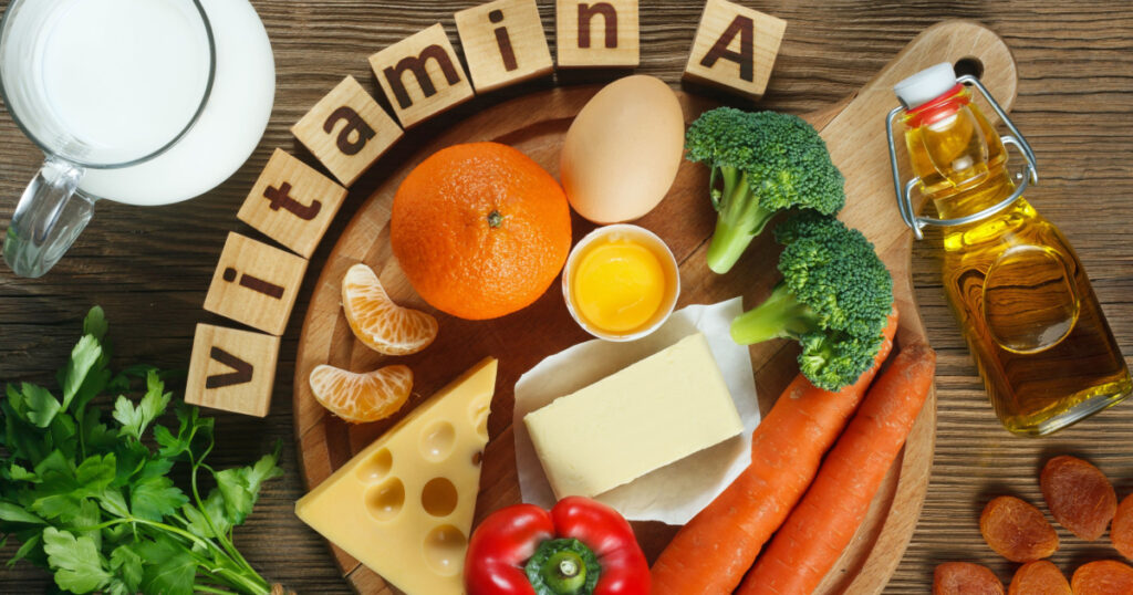 "Vitamin A in food" Natural products rich in vitamin A as tangerine, red pepper, parsley leaves, dried apricots, carrots, broccoli, butter, yellow cheese, milk, egg yolk and cod liver oil.