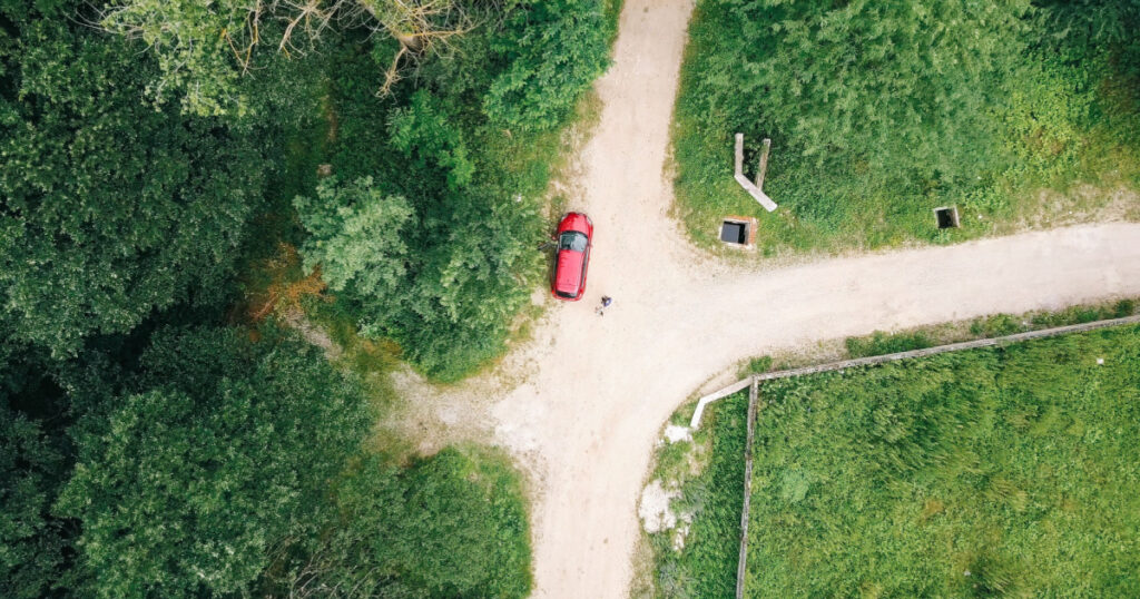 Aerial Drone View Of Lost Travelers In Forest