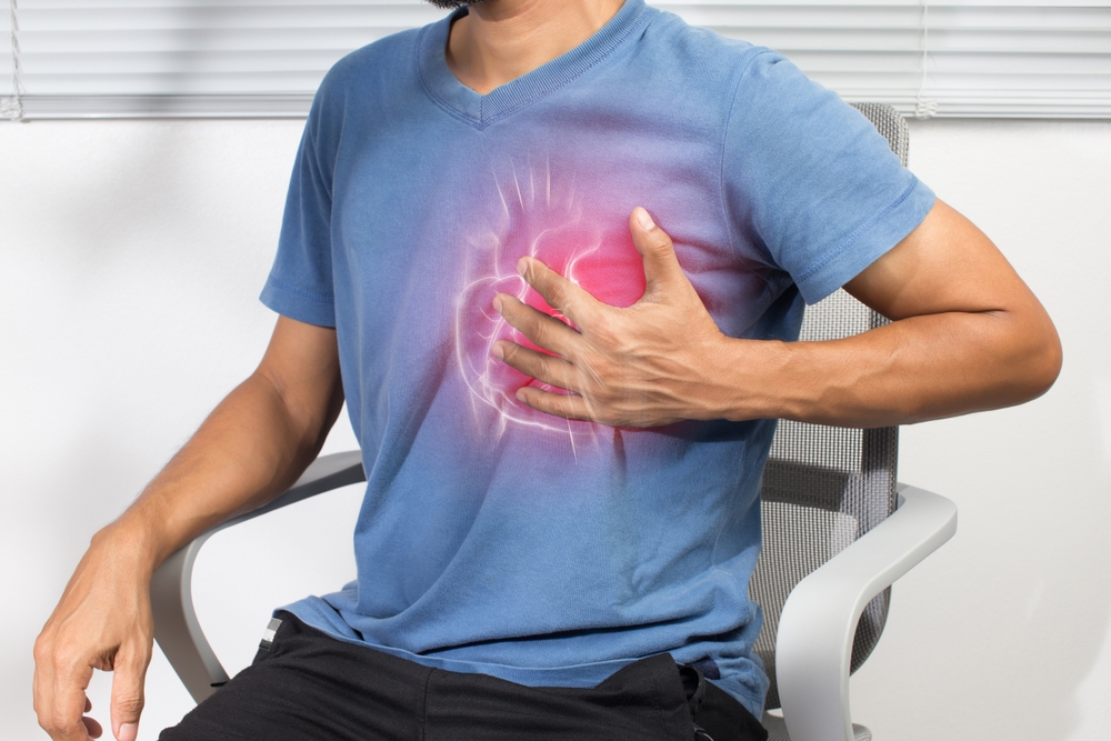 An Asian man has chest tightness due to a heart attack. Coronary artery disease
