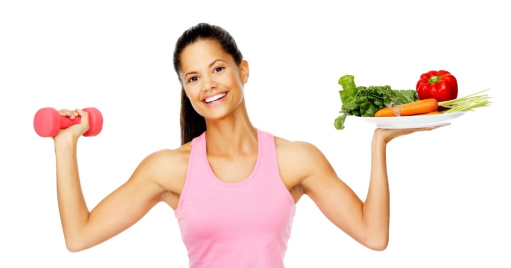 Portrait of a healthy woman with vegetables and dumbbells promoting a healthy fitness and eating lifestyle