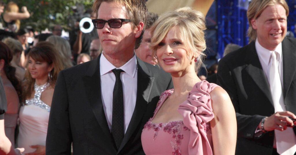 Kevin Bacon and Kyra Sedgwick at the 61st Annual Primetime Emmy Awards. Nokia Theatre, Los Angeles, CA. 09-20-09