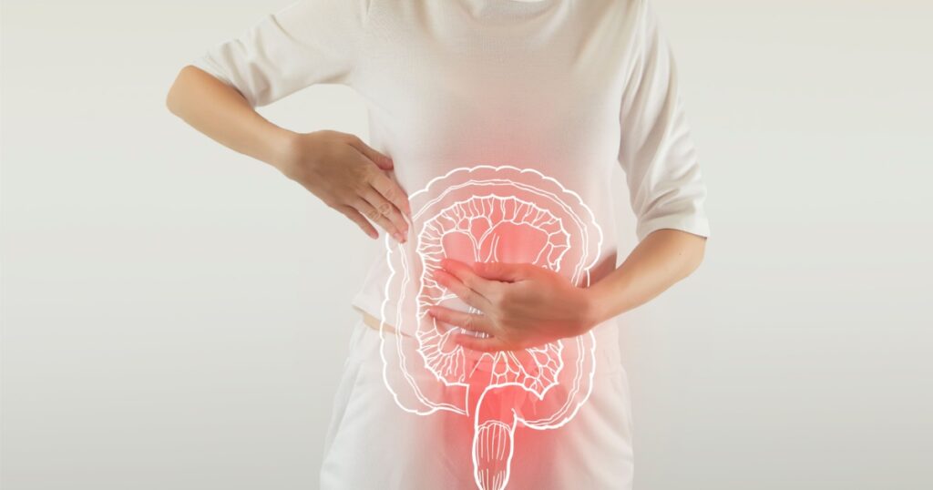 Digital composite of highlighted red painful intestine of woman / health care & medicine concept