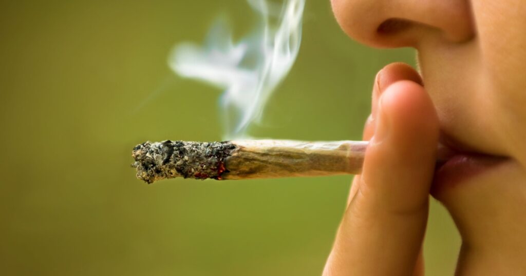 girl smoking marijuana close up