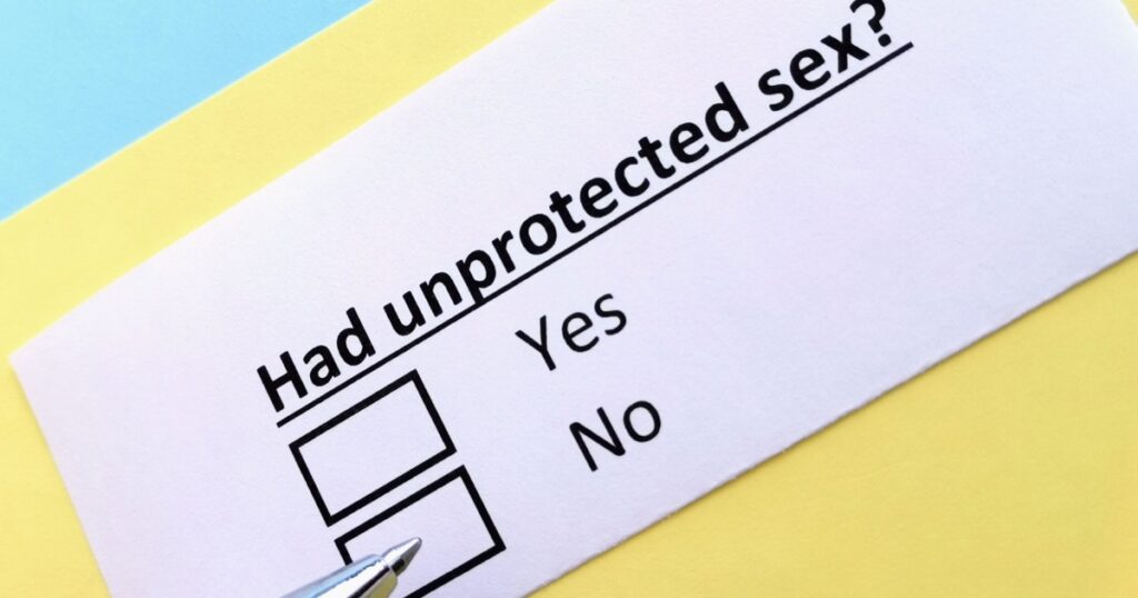 One person is answering question about unprotected sex. The person denies having unprotected sex.